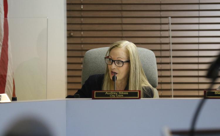 City Clerk Audrey Sikes responds to criticism from Councilwoman Chevella Young during Tuesday’s meeting. (JAMIE WACHTER/Lake City Reporter)