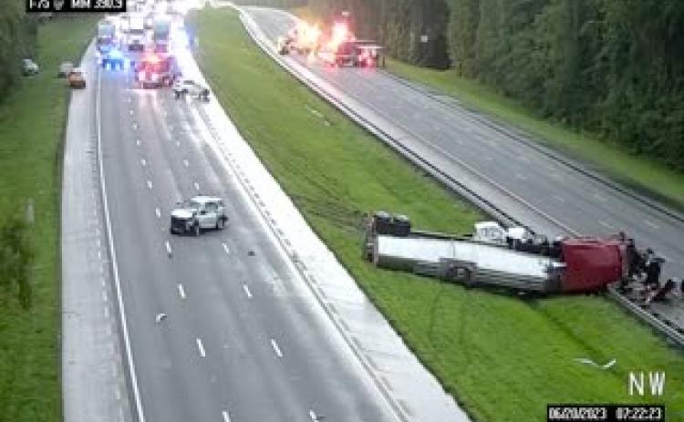 A still image from a surveillance camera on Interstate 75 shows the wreck that led to a day of lane closures and detours. (COURTESY)