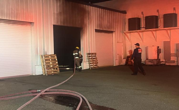 Crews from Lake City Fire Department and Columbia County Fire Rescue extinguished a fire around 3 a.m. Tuesday in the service area of the Honda of Lake City dealership. (COURTESY)
