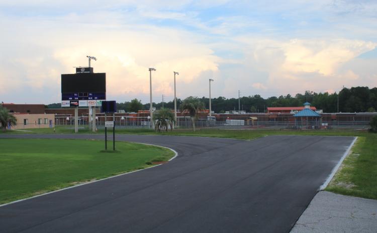 The Columbia High track is being resurfaced, a project that is expected to be completed before the school year starts in August. Once completed, the track will be able to host a wide array of meets. (TONY BRITT/Lake City Reporter)