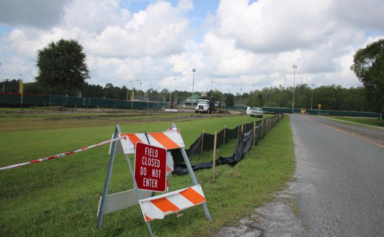 Crews work on a project at Southside Sports Complex to add 90 new parking spots as well as address drainage issues at the recreation complex. (TONY BRITT/Lake City Reporter)