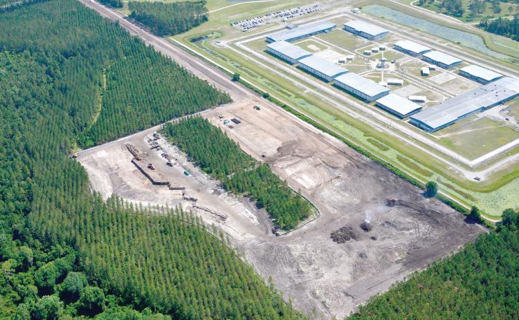 Wharton-Smith is constructing the wastewater treatment plant for the North Florida Mega Industrial Park. Lake City and Columbia County officials are working through a ‘misunderstanding’ over who will provide water at the facility. (COURTESY AERO PHOTO)