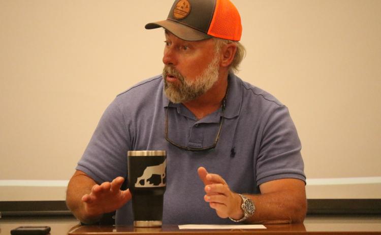 Columbia County Assistant County Manager Kevin Kirby discusses the need for an organized group dealing with regional utilities at a meeting Wednesday. (JAMIE WACHTER/Lake City Reporter)
