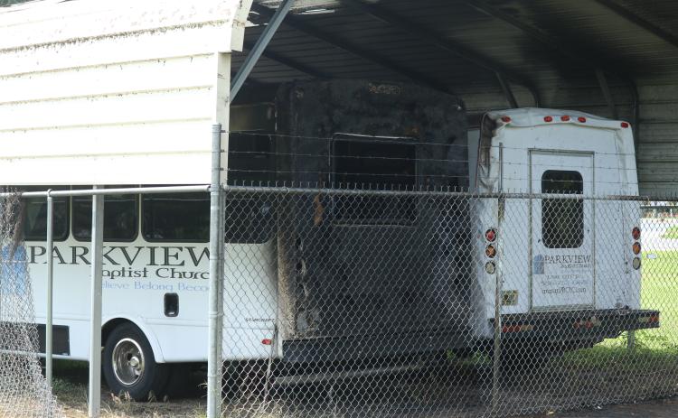 Parkview Baptist Church’s two buses were damaged in a fire Wednesday night. (JAMIE WACHTER/Lake City Reporter)