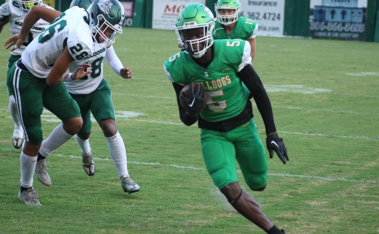 Suwannee receiver MJ Rossin runs up the field for a touchdown against Flagler Palm Coast on Friday night. (JAMIE WACHTER/Lake City Reporter)