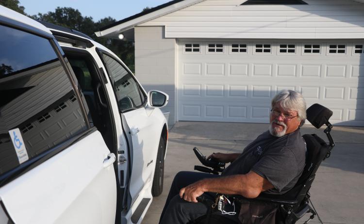 Jeff Woods, a disabled veteran, is pushing for Lake City businesses to comply with the Americans with Disabilities Act and make things easier for him and other disabled individuals. (MORGAN MCMULLEN/Lake City Reporter)