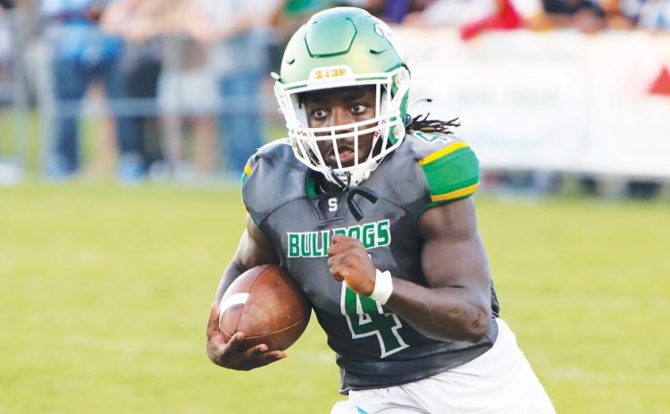 Suwannee running back Marquavious Owens rushes up the field against Columbia during Friday’s Preseason Classic. (BRENT KUYKENDALL/Lake City Reporter)