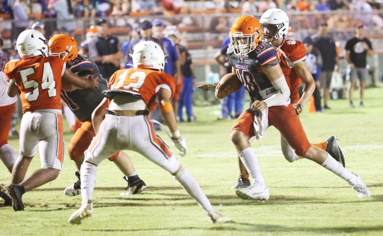 Branford quarterback scrambles up the field against Trenton during last Friday’s jamboree. (PAUL BUCHANAN/Special to the Reporter)