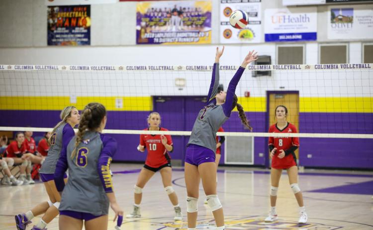 Columbia setter Mylie Fernandez (7) passes a shot to a teammate against Lafayette on Tuesday night. (BRENT KUYKENDALL/Lake City Reporter)