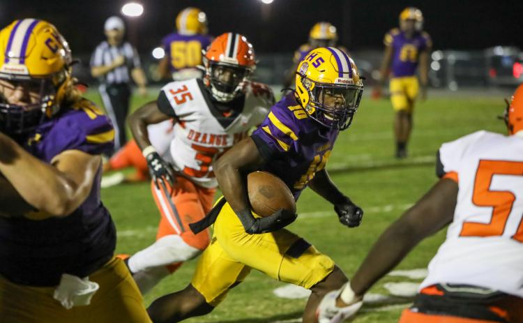 Columbia receiver Zamarion Jones runs up the field after a catch against Orange Park on Friday. Jones caught one of five touchdown passes from freshman quarterback Xavier Collins. (BRENT KUYKENDALL/Lake City Reporter)