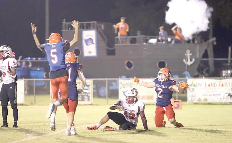 Branford players celebrate after running back Trevor Maddox scored the go-ahead touchdown with 15 seconds left Friday night to lift the Bucs past Hilliard. (ERIN ROBERTS/Special to the Reporter)