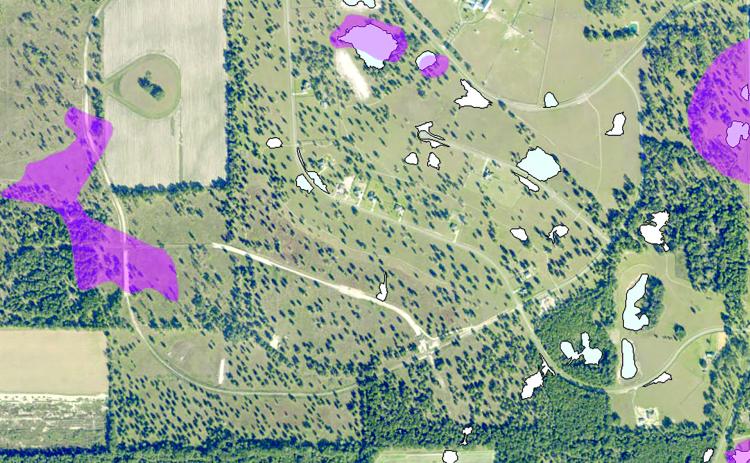 A revised FEMA flood risk map shows areas in The Oaks of Lake City subdivision that will be in flood zones, including new areas that are shaded blue. The Suwannee River Water Management District and FEMA are continuing to revise the maps after receiving hundreds of objections from the public earlier this year. (COURTESY SUWANNEE RIVER WATER MANAGEMENT DISTRICT)
