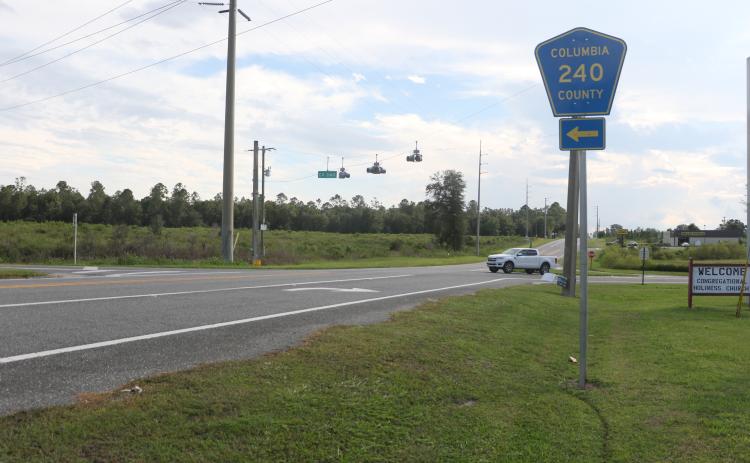 A vehicle pulls into the County Road 240 and State Road 247 intersection in southwestern Columbia County on Friday afternoon. Florida Department of Transportation plans to revamp the skewed intersection have been shelved after concerns from residents. (MORGAN MCMULLEN/Lake City Reporter)