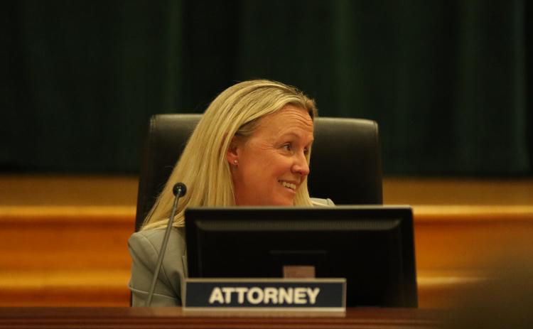 Columbia School District Attorney Megan Logan speaks during Tuesday’s meeting. (JAMIE WACHTER/Lake City Reporter)