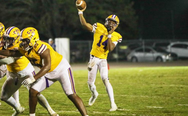 Columbia quarterback Xavier Collins throws a pass against Bolles on Friday. (BRENT KUYKENDALL/Lake City Reporter)