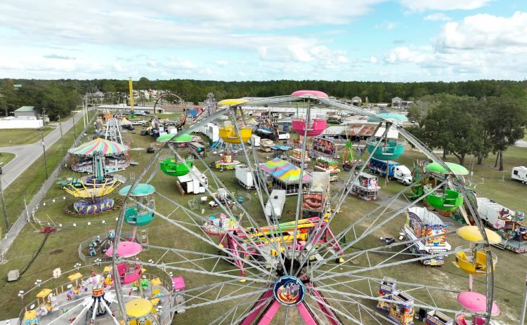 The midway is set up at the Florida Gateway Fairgrounds awaiting Friday’s open to the 69th annual Florida Gateway Fair. The fair is slated to run through Nov. 5. (RAY CARPENTER/Special to the Reporter)