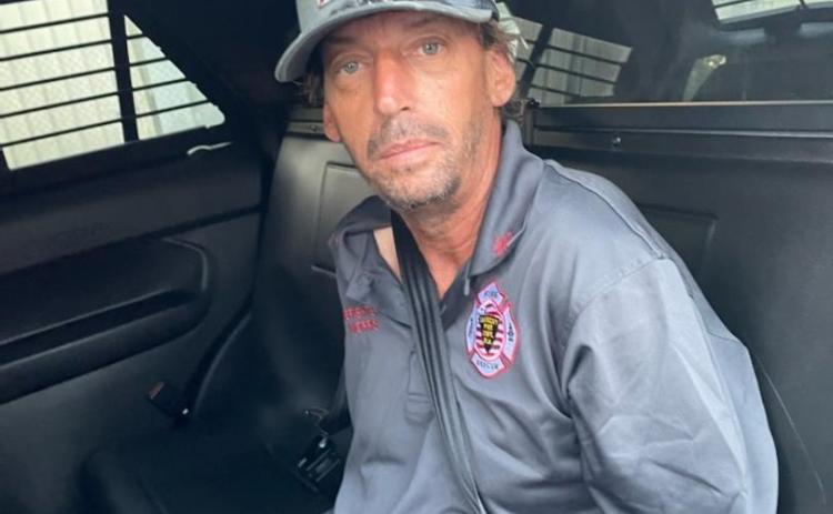 Stephen Bullard was arrested Monday wearing a Lake City firefighter’s uniform shirt that he had stolen from a vehicle that morning. (COURTESY)
