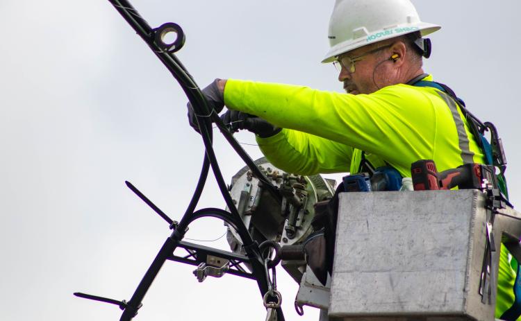 A linemen strings fiber lines for Rapid Fiber Internet, a subsidiary of Suwannee Valley Electric Cooperative. The broadband fiber internet service is up and running in parts of Suwannee County. (COURTESY RAPID FIBER INTERNET)