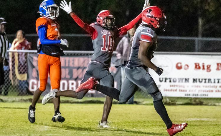 Lafayette’s Jalen Hill scores a touchdown against Taylor County while Jordan Murphy (10) celebrates on Tuesday night. (JACK HOWDESHELL/Special to the Reporter)