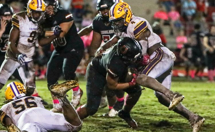 Columbia defensive end Au’vontae Smith makes a tackle against Middleburg on Friday. (BRENT KUYKENDALL/Lake City Reporter)
