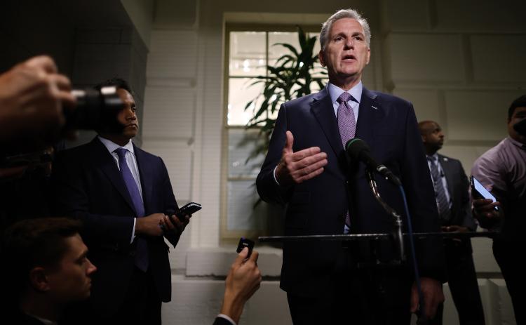 Speaker of the House Kevin McCarthy talks to reporters following a House Republican conference meeting in the U.S. Capitol on Tuesday in Washington, D.C. (CHIP SOMODEVILLA/Getty Images/TNS)