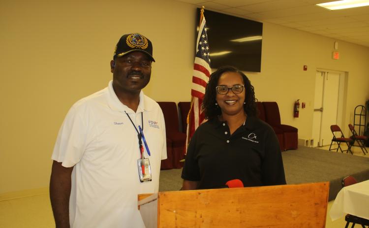 Shawn Raggins with the Florida Department of Veterans Affairs and Paulette Julien with Cooper’s Funeral Home spoke Saturday at a luncheon at Olivet Missionary Baptist Church about the importance of recognizing veterans and getting their their benefits and recognition. (TONY BRITT/Lake City Reporter)