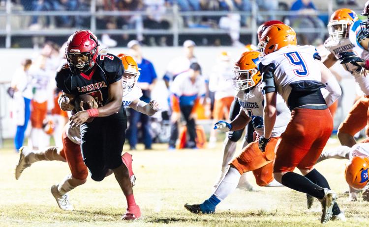 Lafayette running back Jay Ervin runs through the Branford defense during last Friday’s Region 3-1R quarterfinal. (JACK HOWDESHELL/Special to the Reporter)