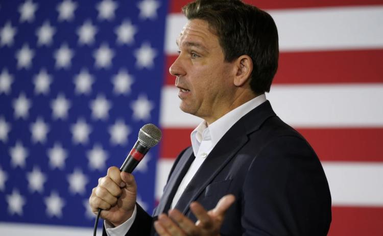 Republican presidential candidate Florida Gov. Ron DeSantis speaks during a meet and greet on Dec. 7 in Cedar Rapids, Iowa. (CHARLIE NEIBERGALL/Associated Press)