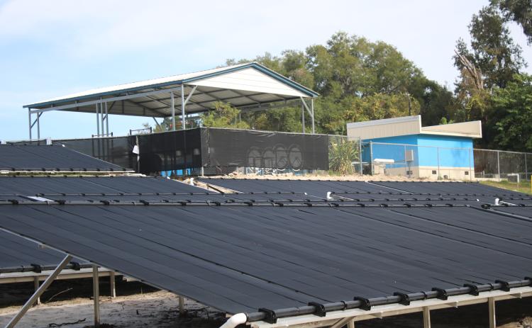 The solar panels at the Jared Allison Aquatic Complex to heat the pool are in place and starting the process to warm up the water. (TONY BRITT/Lake City Reporter)
