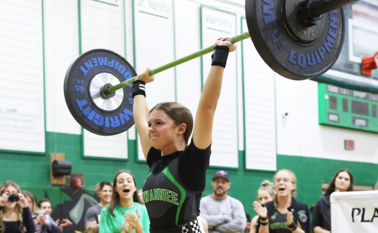Suwannee’s Jordyn Rodriguez performs the clean and jerk during last season’s Power of Christmas meet. (FILE)