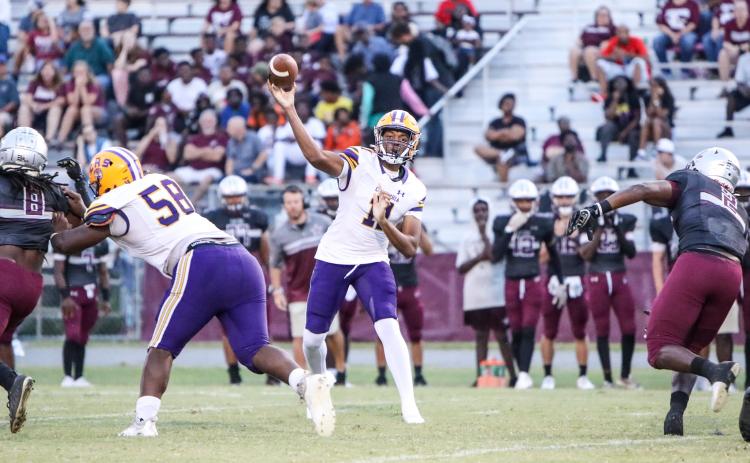 Former Columbia quarterback Zack Paulk throws a pass against Madison County on Sept. 15, 2023. (BRENT KUYKENDALL/Lake City Reporter)
