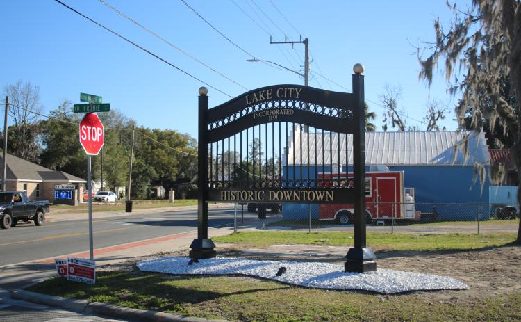 The historic downtown Lake City gate was recently re-erected at the intersection of North Marion Avenue and NW Fronie Street. (TONY BRITT/Lake City Reporter)