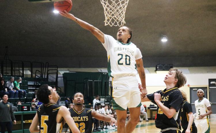 FGC guard Jazan Johnson makes a layup against Pasco-Hernando State College on Wednesday night. (JORDAN KROEGER/Lake City Reporter)