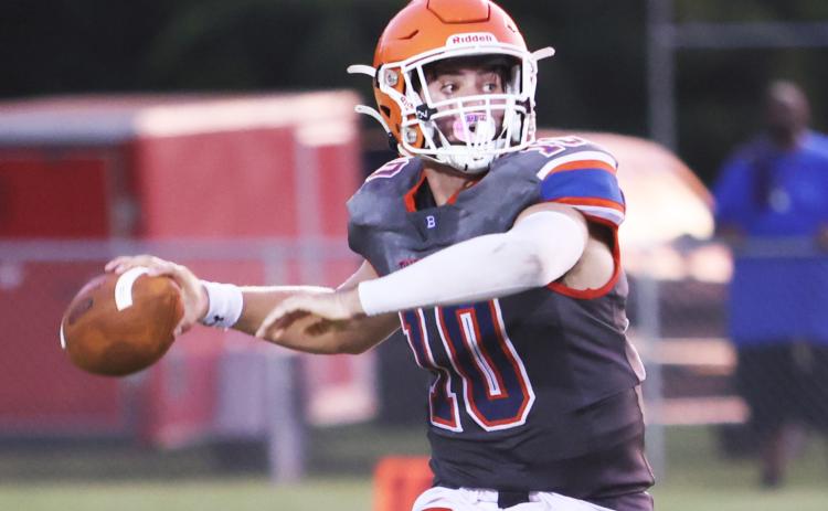Branford quarterback Thomas Sikes throws a pass during the preseason jamboree last season. (PAUL BUCHANAN/Special to the Reporter)