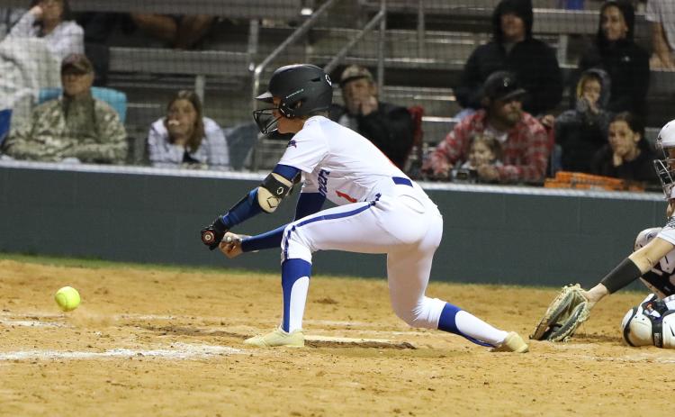 Branford second baseman Payten Bates tries to lay down a bunt against Columbia on Thursday night. (BRENT KUYKENDALL/Lake City Reporter)