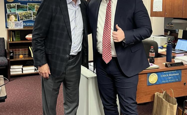 Jason Carter, Rep. Chuck Brannan’s legislative aide, gets a picture with Tom Glavine during the Hall of Fame pitcher’s stop at the Capitol. (COURTESY)