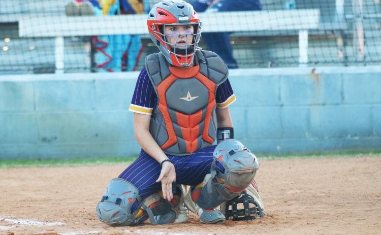 Columbia catcher Emily Delgado looks to the dugout during a game against Taylor County last season. (JORDAN KROEGER/Lake City Reporter)