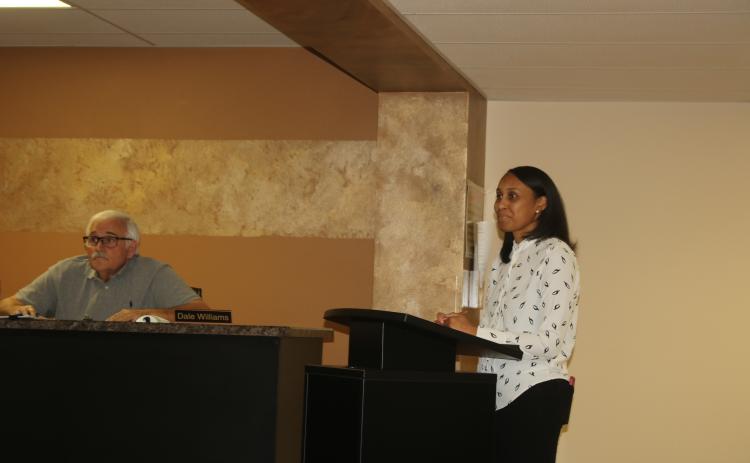 Erica Mayo presents her plan for the Mayo Pharmacy and Wellness Center to the Lake Shore Hospital Authority board Monday night. (TONY BRITT/Lake City Reporter)