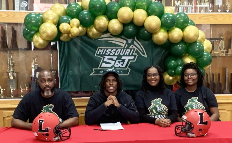 Lafayette's Jalen Hill signed his letter of intent to play at Missouri S&T on Wednesday. (COURTESY)