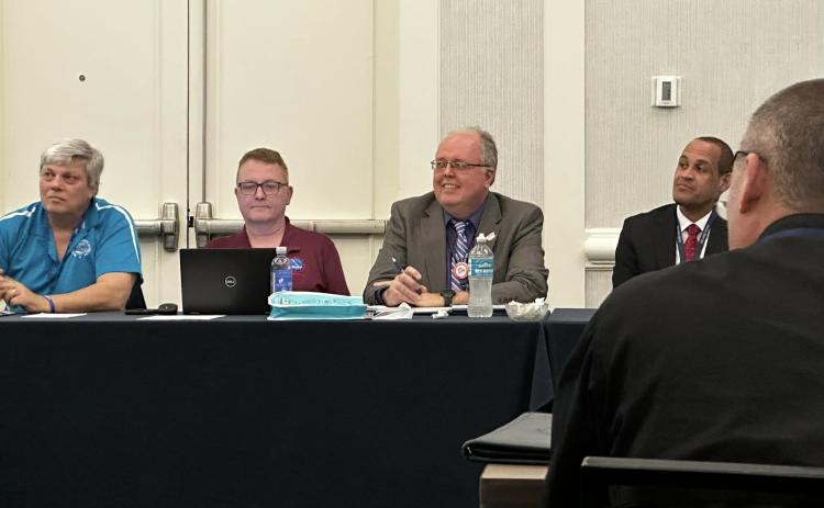 Columbia County Emergency Management Director Shayne Morgan (second from right) listens during a panel discussion at the 2024 Florida Emergency Preparedness Association conference. (COURTESY)