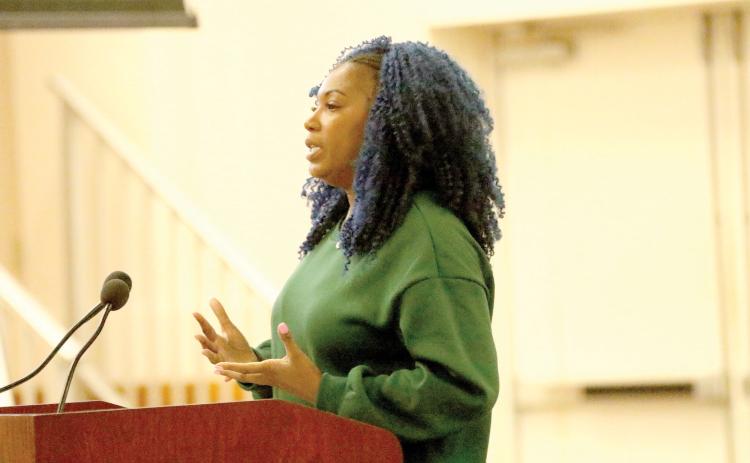 Vanessa George with Twentyeight Fourteen and October Realty presents the public-private partnership ask of $1 million from the County Commission to build affordable housing in Lake City. (JAMIE WACHTER/Lake City Reporter)