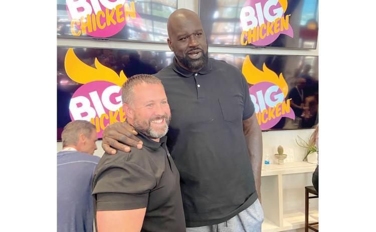 Chris McMillan, the CEO of the Panhandle Restaurant Group that is opening a Big Chicken restaurant in Lake City, is pictured with Big Chicken founder Shaquille O’Neal. (COURTESY)