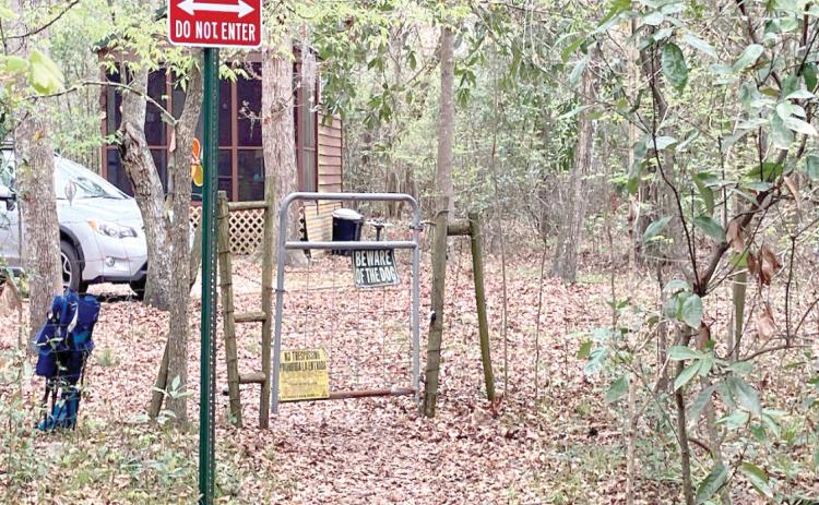 A gate into Rum Island Park from a neighboring property that stands in place of a county fence, which Columbia County officials say was cut to provide free access into the park. (COURTESY)