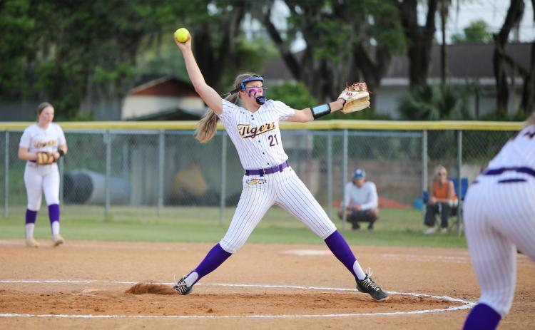 Columbia pitcher Harleigh Price winds up to pitch against Trenton on Tuesday night. (BRENT KUYKENDALL/Lake City Reporter)