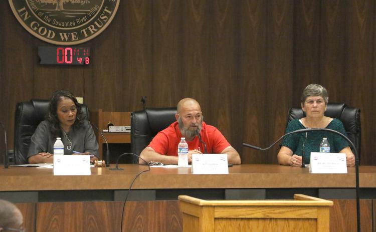 Live Oak Council candidates Vanessa Brown Robinson (from left), Jeff Chaillou and Gladys Owens answer questions from the dais during Monday’s candidate forum hosted by the Suwannee County Voters League. (MORGAN MCMULLEN/Lake City Reporter)