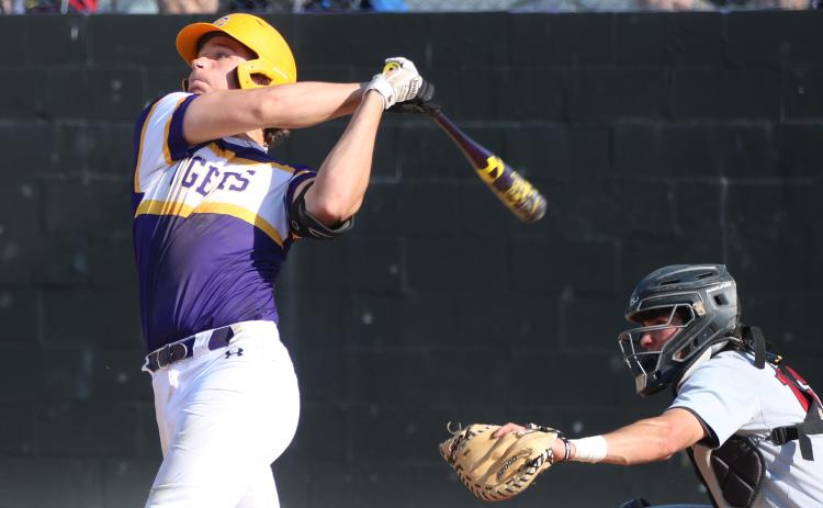 Columbia’s Ayden Phillips makes contact with a pitch against North Florida Christian on Tuesday. (JORDAN KROEGER/Lake City Reporter)