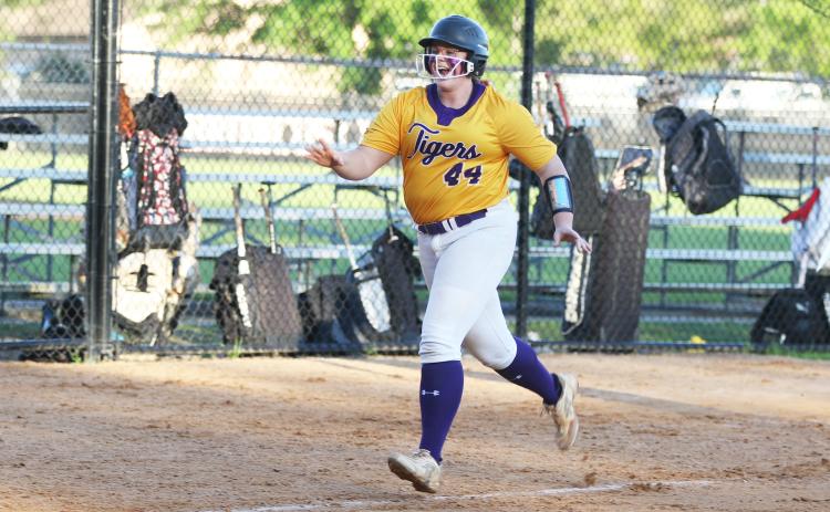 Columbia’s Josie Raulerson celebrates running toward home plate after hitting a home run against Middleburg on March 28. (MORGAN MCMULLEN/Lake City Reporter)