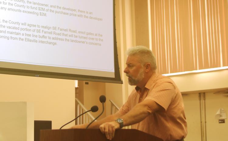 Assistant County Manager Kevin Kirby speaks during Thursday’s Columbia County Commission meeting on the need to relocate parts of SE Farnell Road to better accomadate growth in Ellisville. (TONY BRITT/Lake City Reporter)