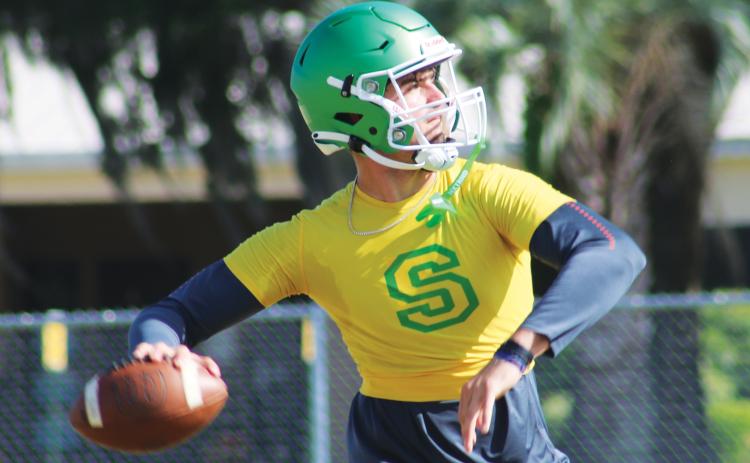 Suwannee quarterback Thomas Sikes drops back to pass during practice on April 29. (JAMIE WACHTER/Lake City Reporter)