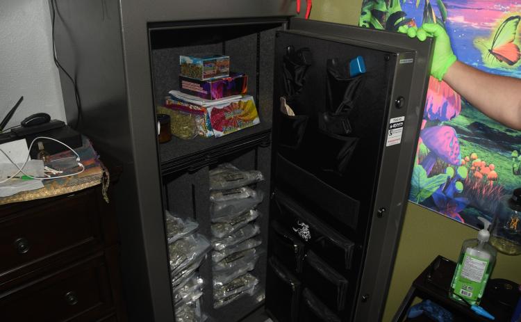 During a drug bust Friday at a Koonville Avenue residence, drugs were found in a gun safe in one of the bedrooms, as well as in the kitchen cabinets and on the porch. (COURTESY)